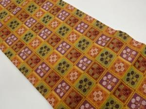 格子に草花・抽象華紋模様織出し名古屋帯(松葉仕立て)